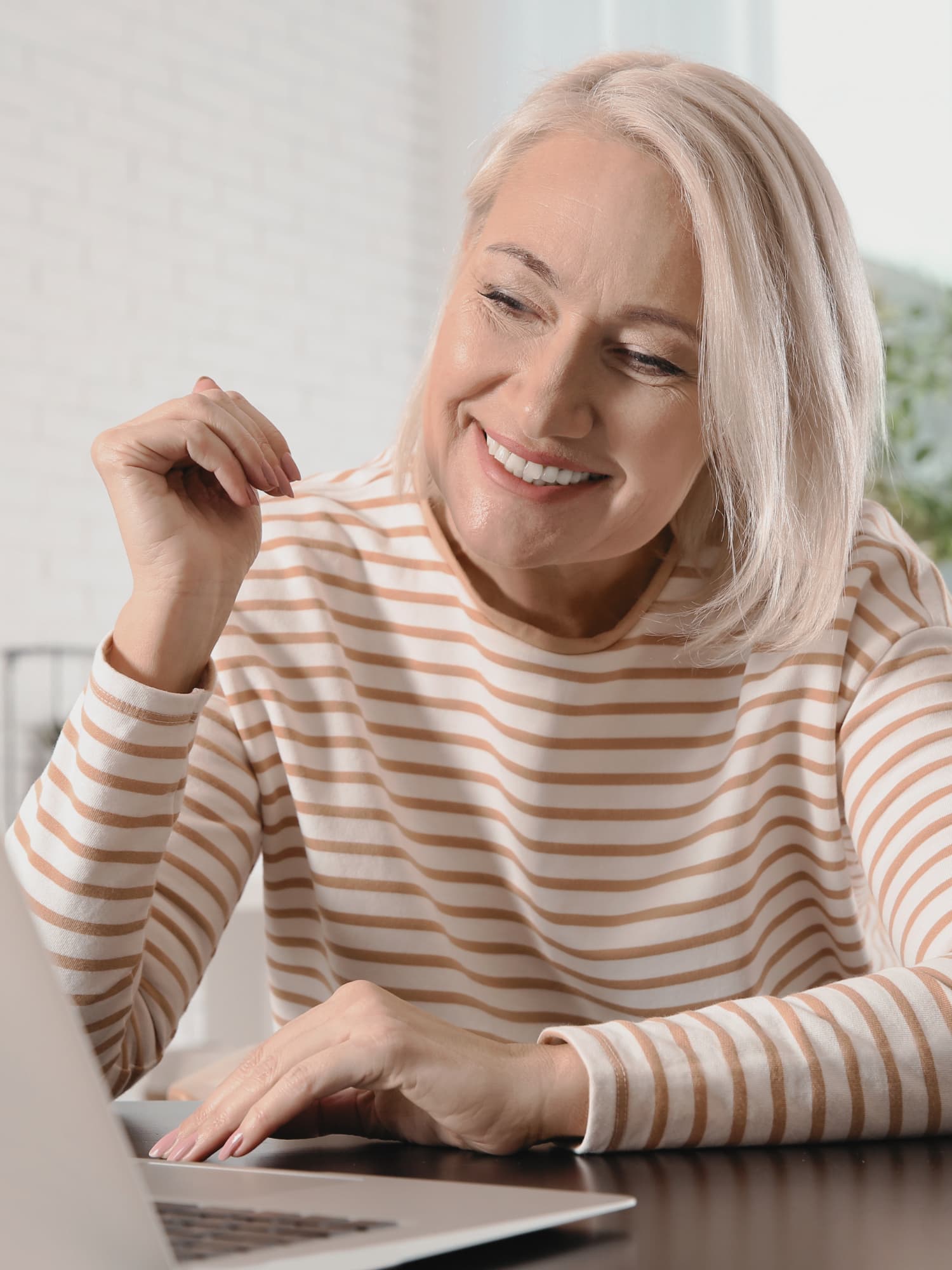 Happy Woman Watching Computer Video